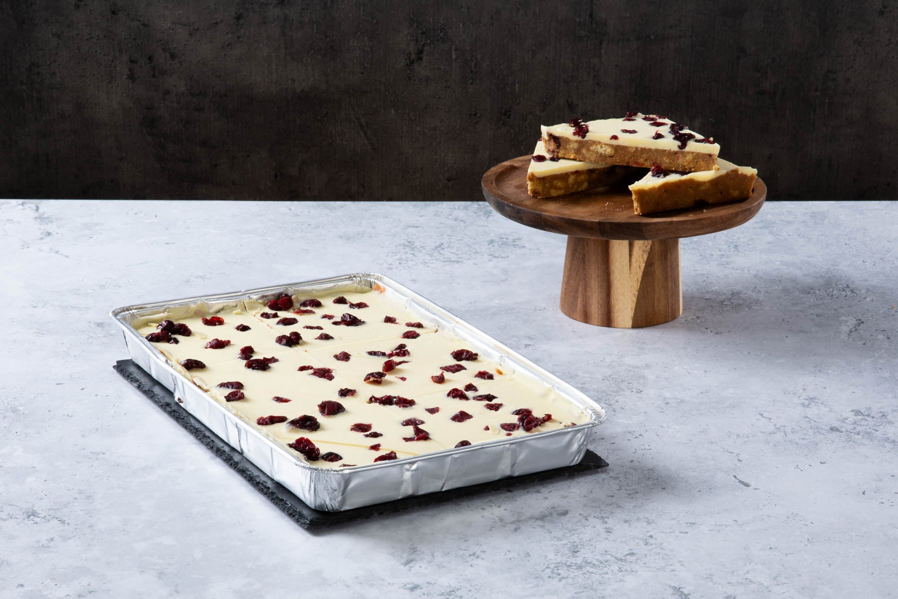 LHMC004-161.jpg Cranberry blondie traybake with white chocolate topping.