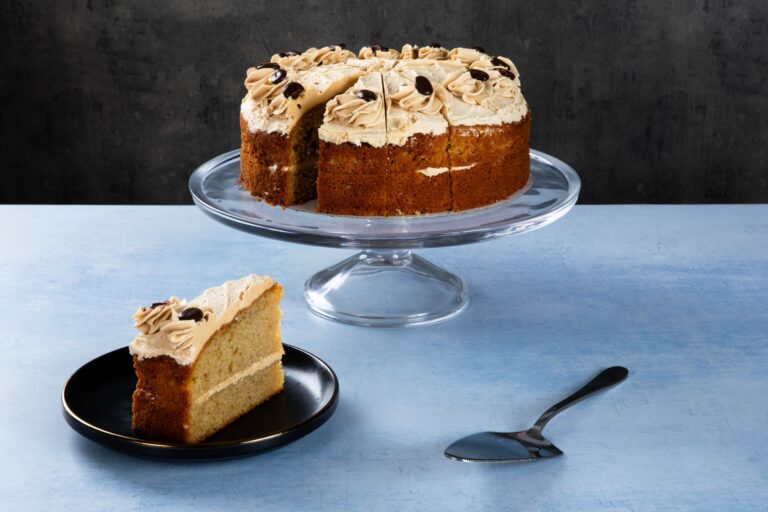 Chocolate cake with chocolate frosting and chocolate shavings.