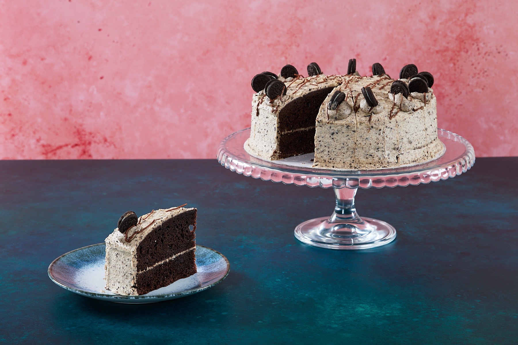 Cookies and cream cake with chocolate cookie pieces and cream frosting.