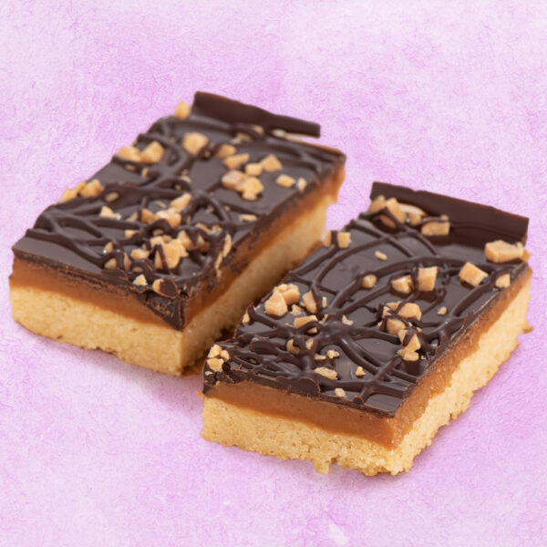 Caramel shortbread traybake slices with dark chocolate drizzle