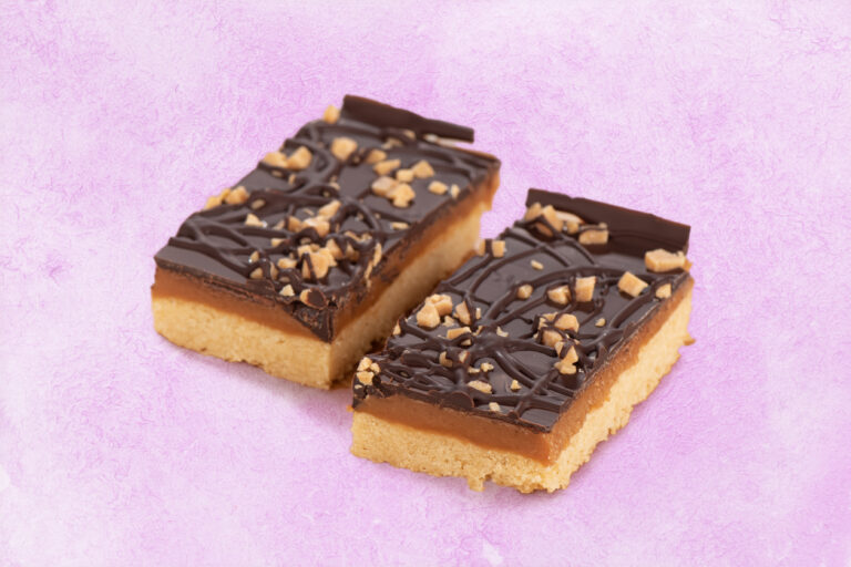 Caramel shortbread traybake slices with dark chocolate drizzle