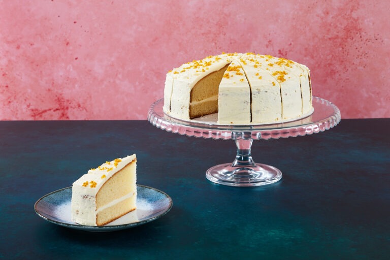 Persian-style lemon cake with lemon frosting and pistachios.