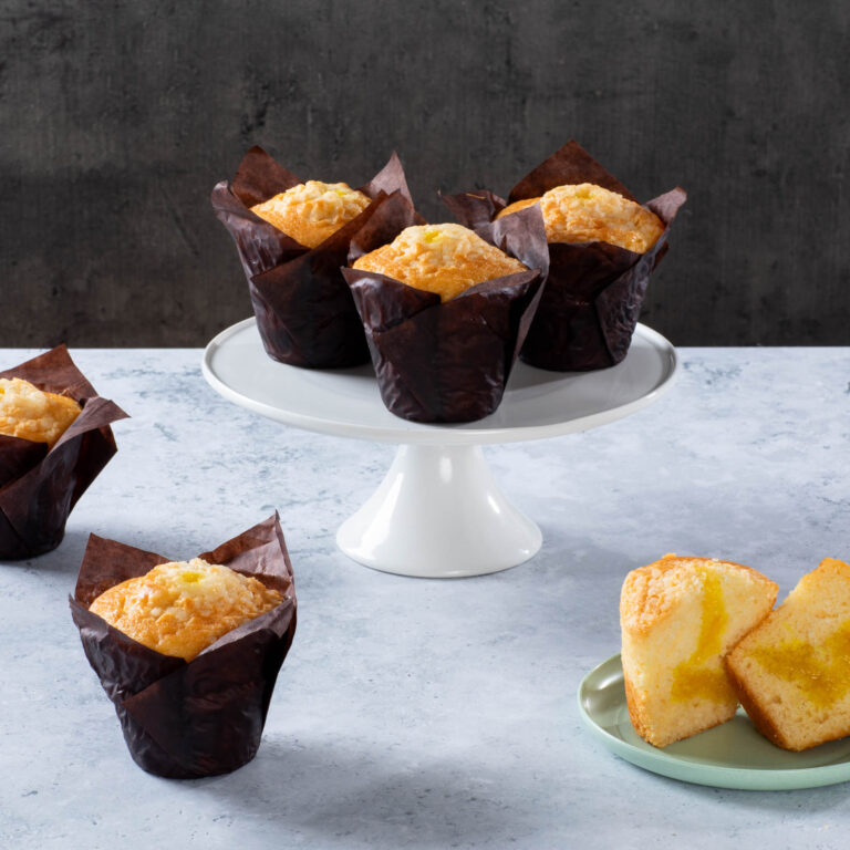 Lemon pearl muffin with white chocolate topping.